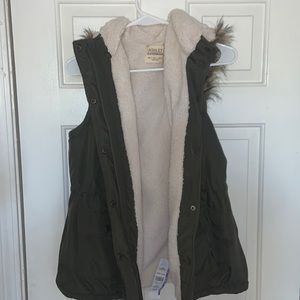 Green/white furry vest!